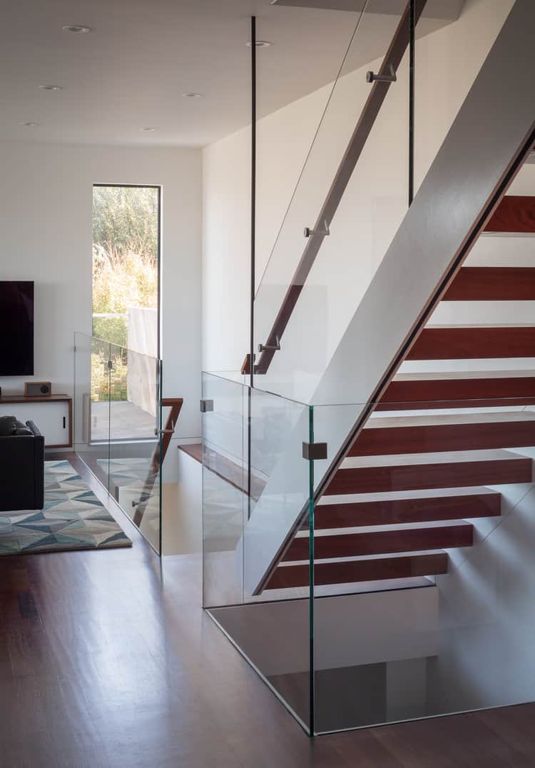The upper level consists of an open living space.