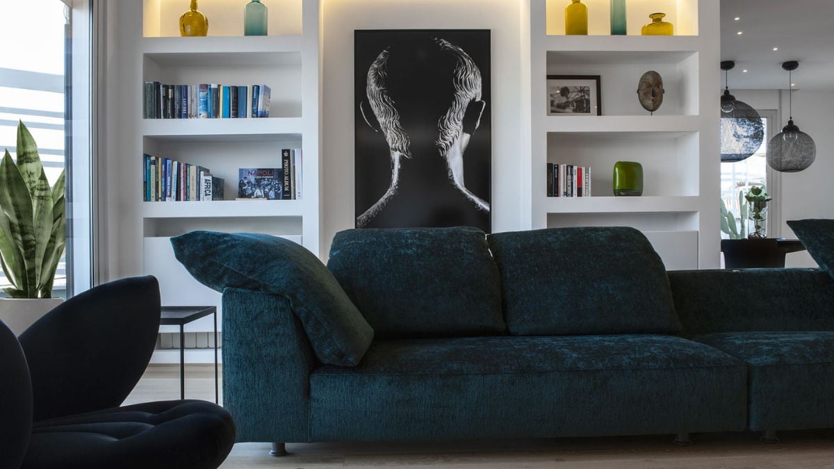 A modern two-story luxurious penthouse with a deisign of a sleek and contemporary elements.