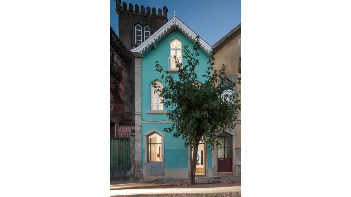A picture of an eccentric building with a surprising alpine influence while integrating conventional 19th-century Portuguese architecture and urban planning.