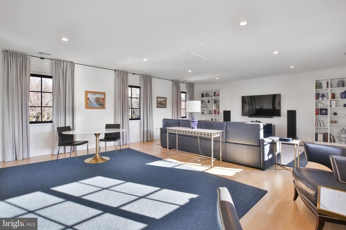 The spacious great room was furnished with a large and inviting sofa offering a cozy retreat.