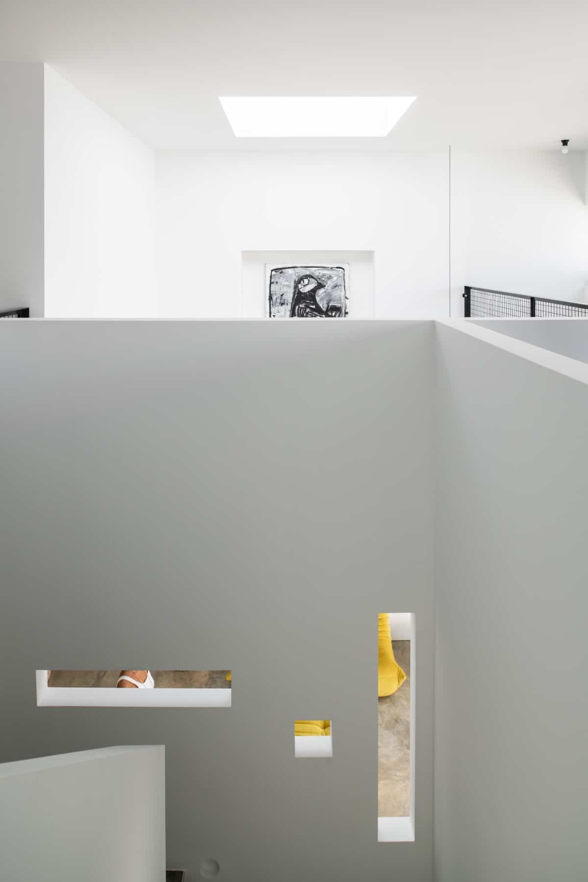 The sitting area is also brightened by a skylight and small openings allow air circulation.