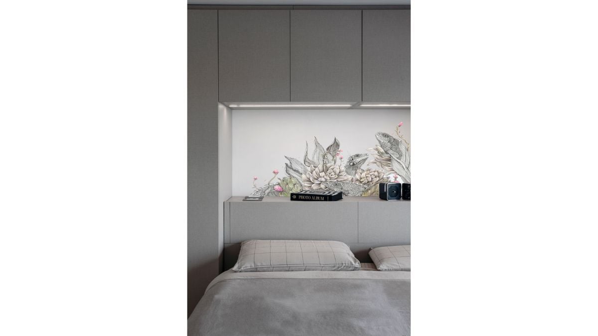 The master bedroom suite, which features a king-sized bed.