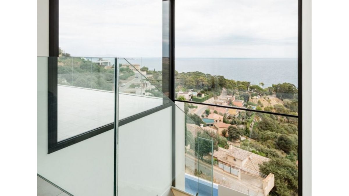 The layout is set up vertically across three levels due to the slope of the ground where the house is situated.