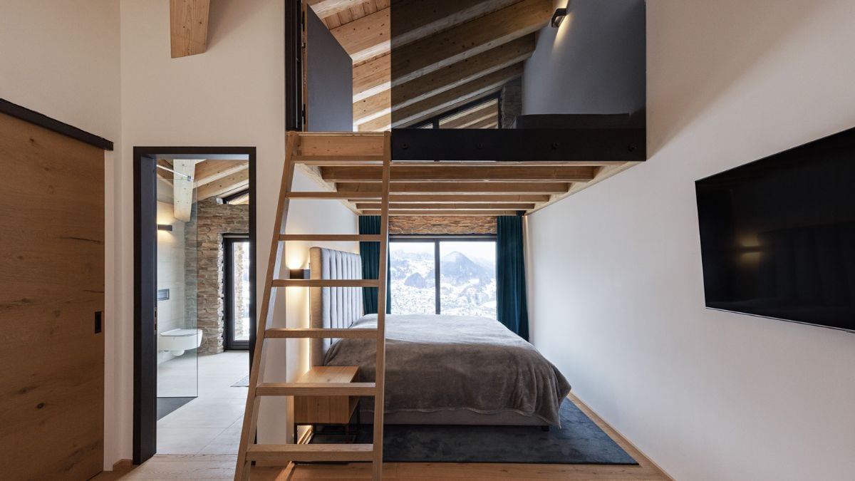 On the top floor, four roomy bedrooms with their own living room and bathroom provide places to hide out and unwind.