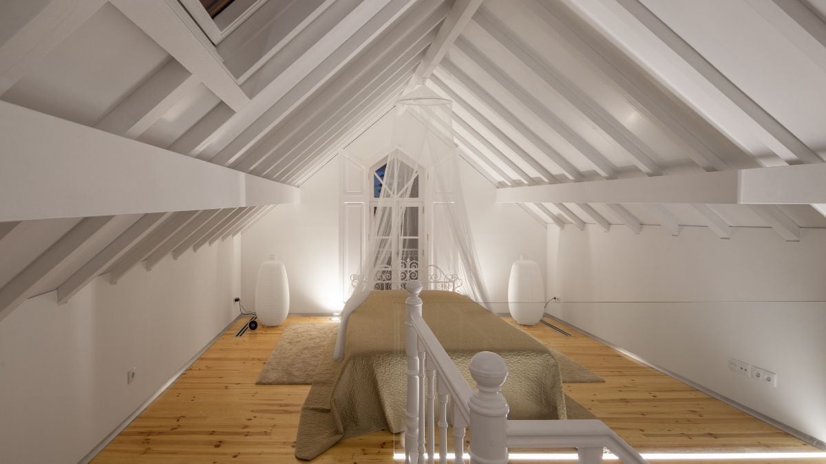 Closet doors made of the same material surround the floor and roof structures, which are both visible in their natural tones.