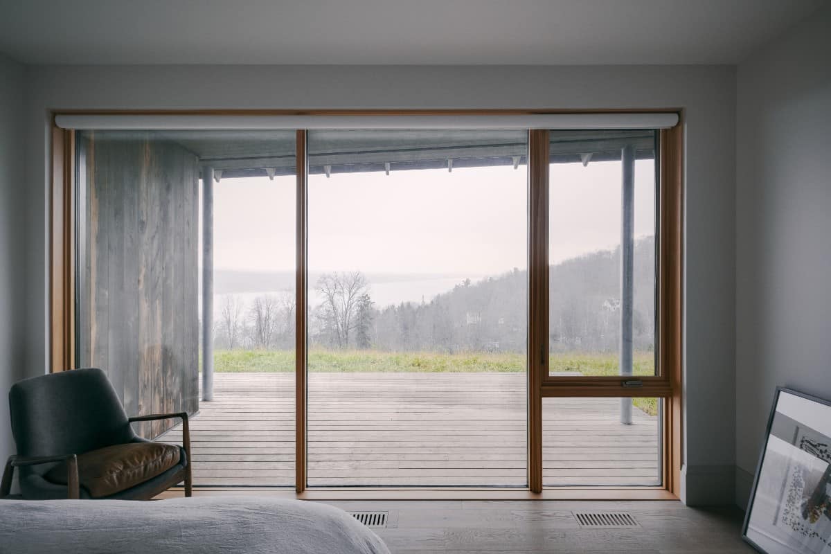 The guest bedroom also includes private deck access.