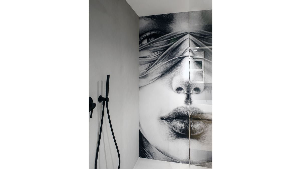 The bathroom is made entirely of glass, which exudes elegance.
