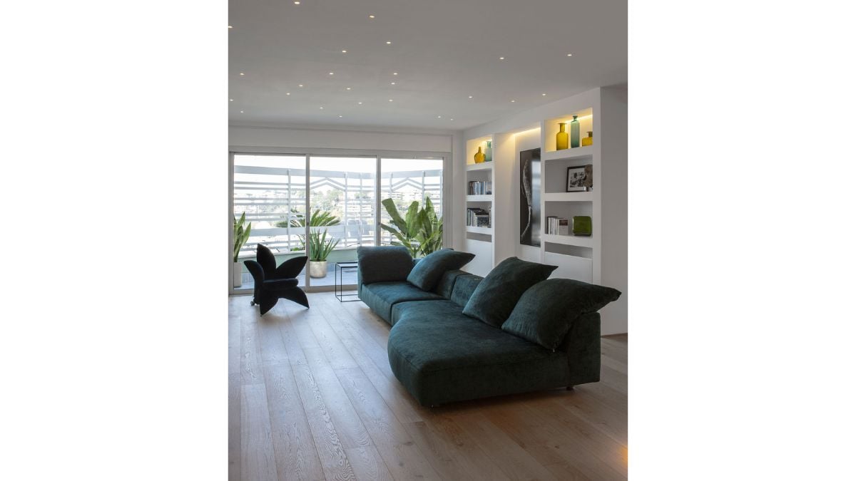 The first floor has spacious living room with large windows.