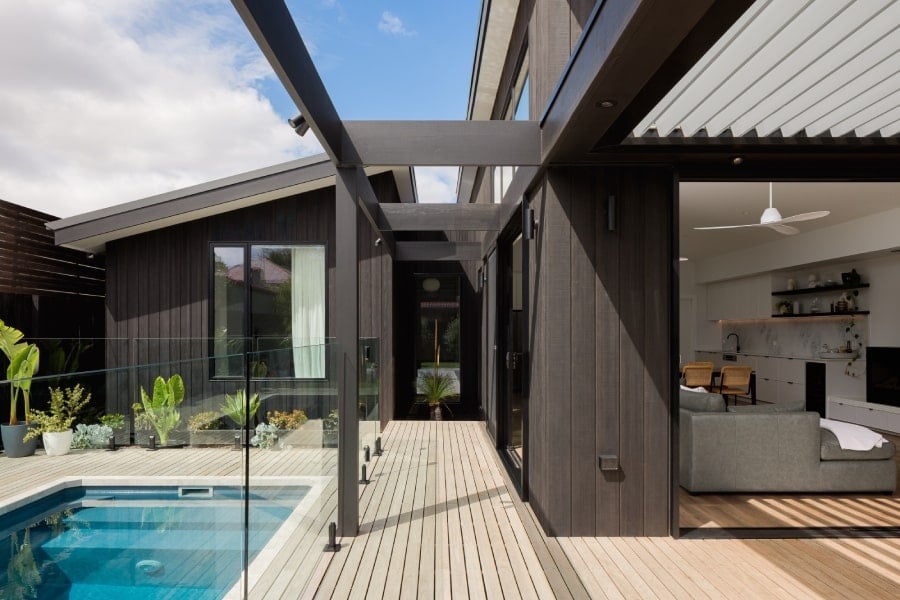 The house is made of modern timber cladding.