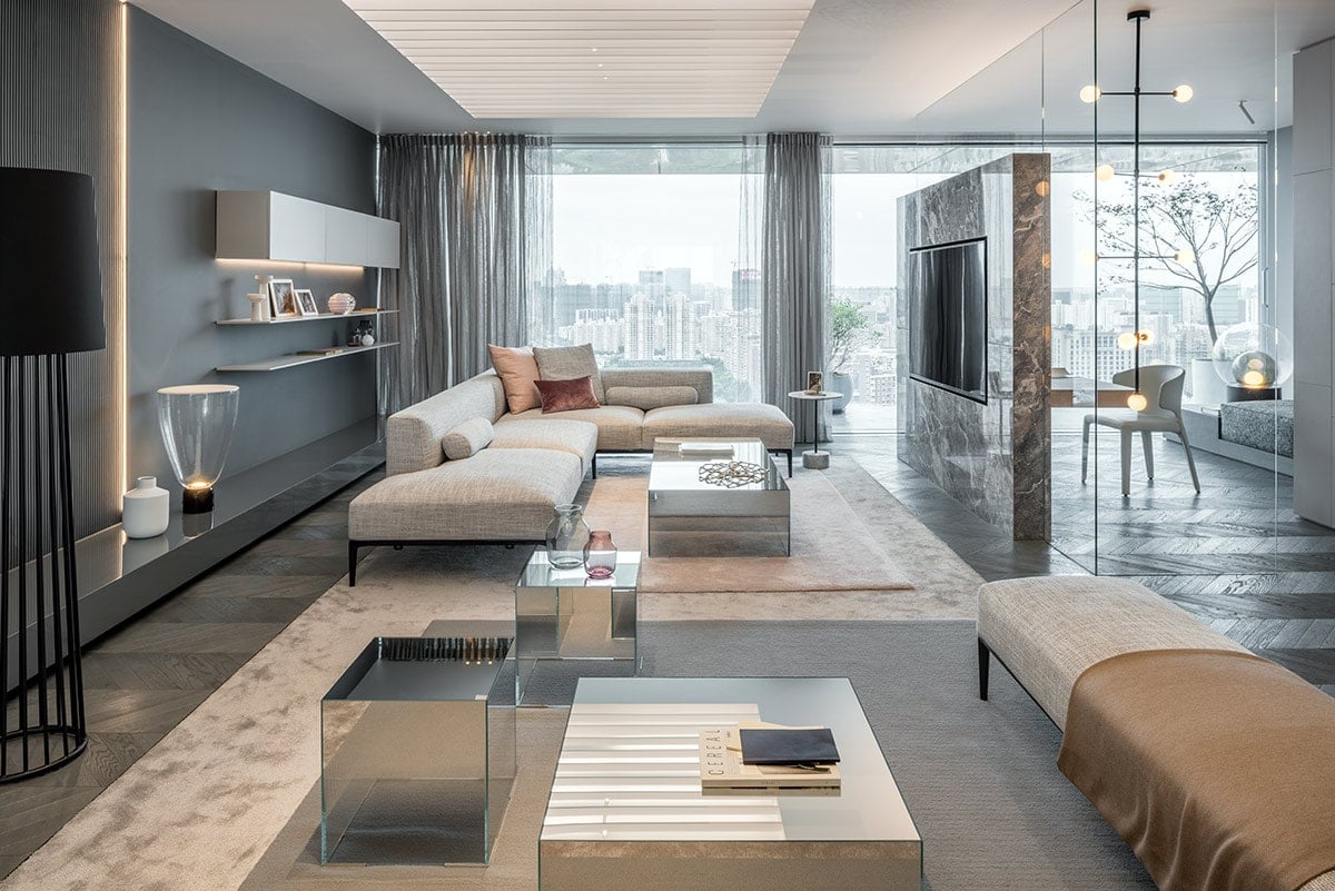 A spacious living-dining area with an integrated floor-to-ceiling extends across the entire apartment width. 