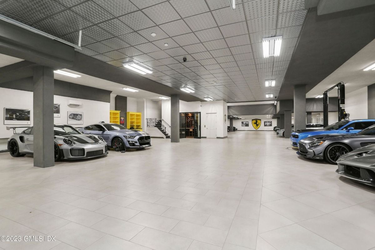 The garage was a car lover's paradise, with ample room to accommodate an impressive collection of 30 vehicles.