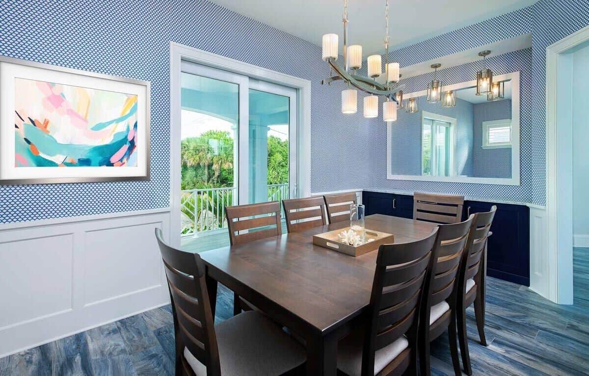 The dining room offers a wooden dining set, a built-in buffet bar, and direct access to the front porch.