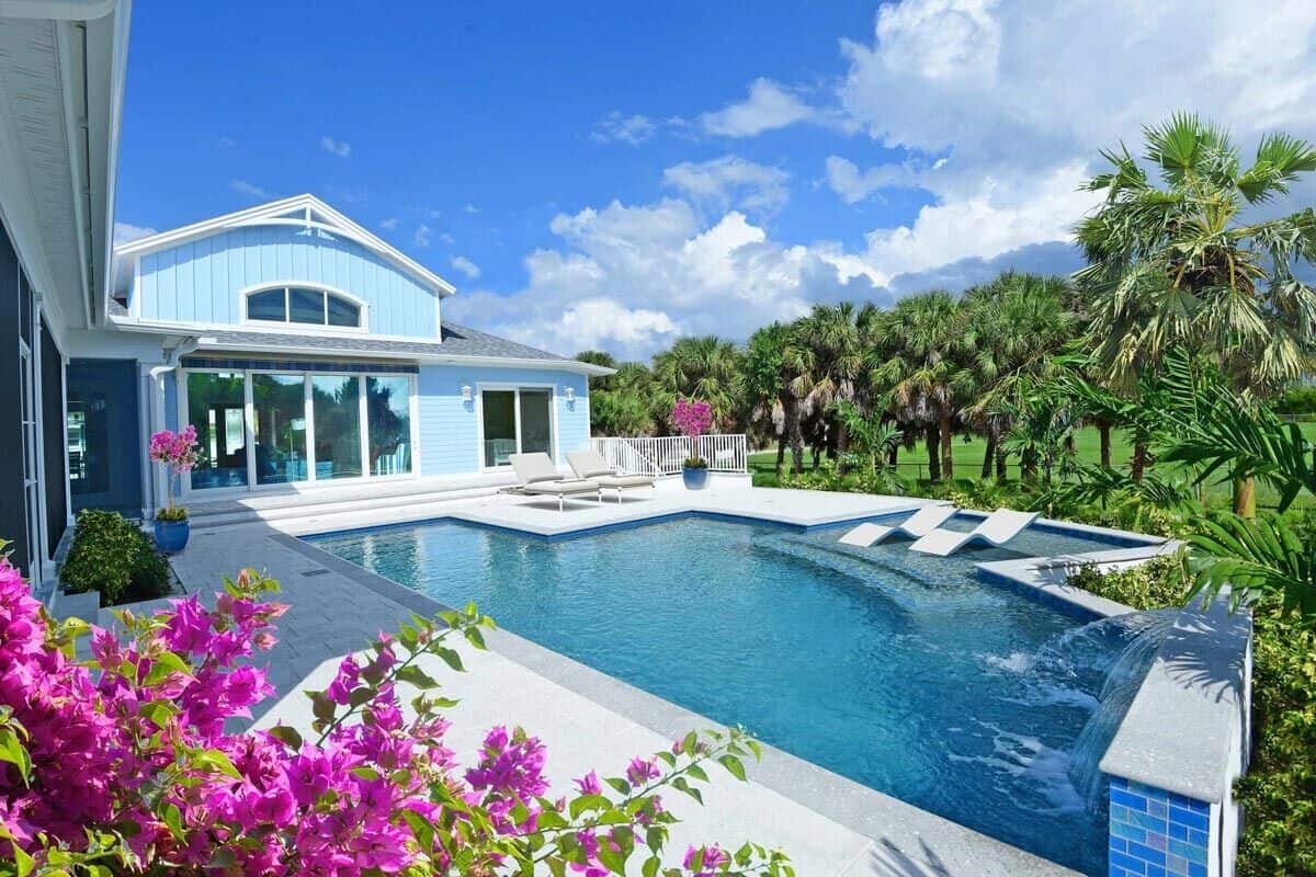 The pool terrace provides great outdoor entertaining. It features a lovely waterfall feature and sunken loungers.