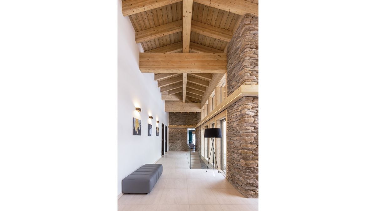 Large glass windows and high ceilings may be found on the upper floor.