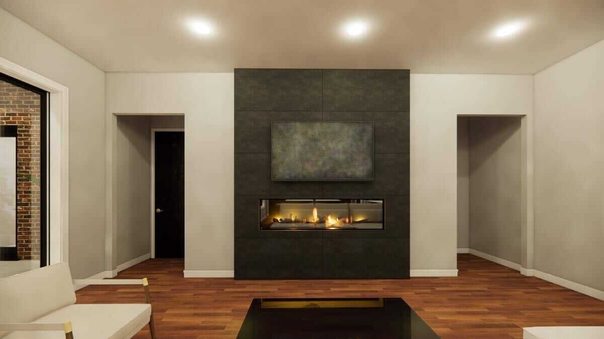 A large fireplace warms the living room.