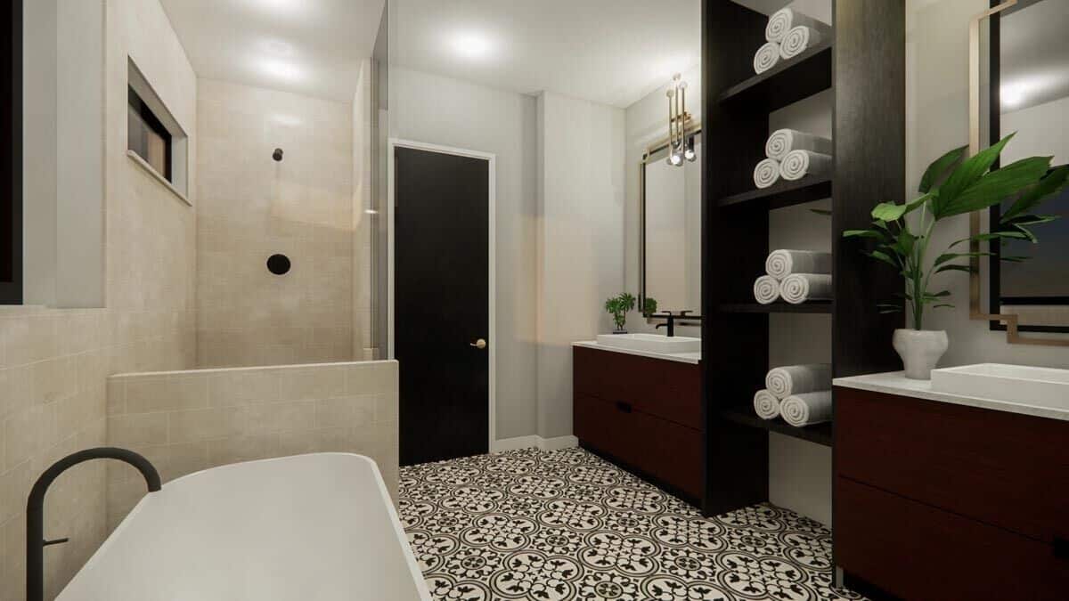 The primary bathroom includes a walk-in shower and a freestanding bathtub.
