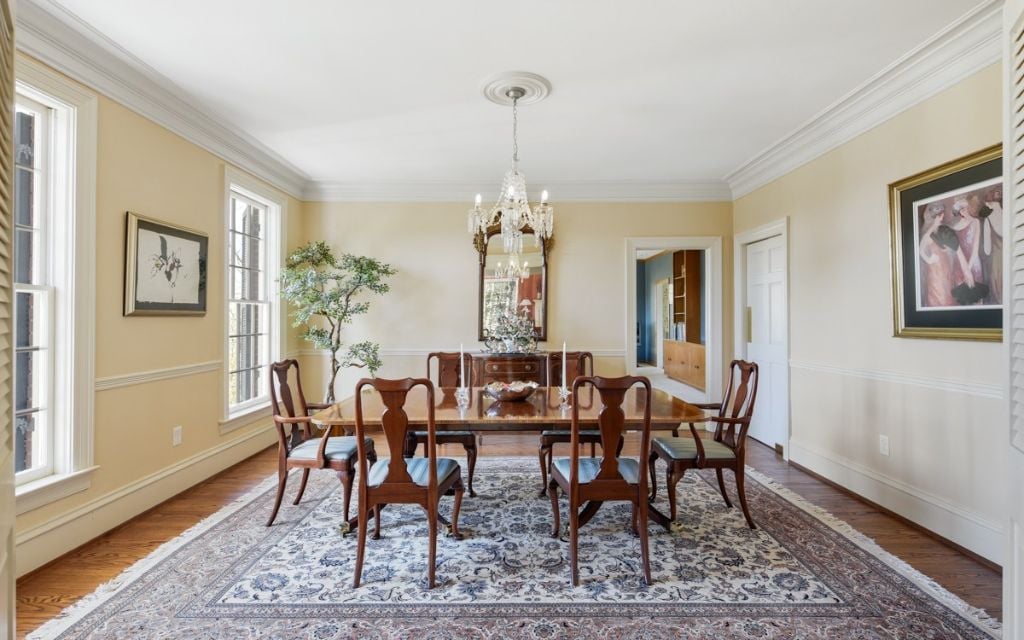Formal Dining Room is left of the entry foyer with a fresh coat of paint.