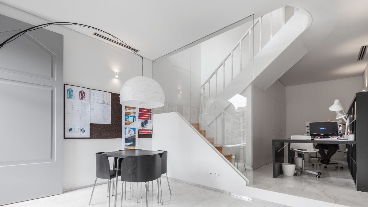 Marble was added to the wet rooms and ground level while keeping the original staircase, wooden floors, and ceiling components.