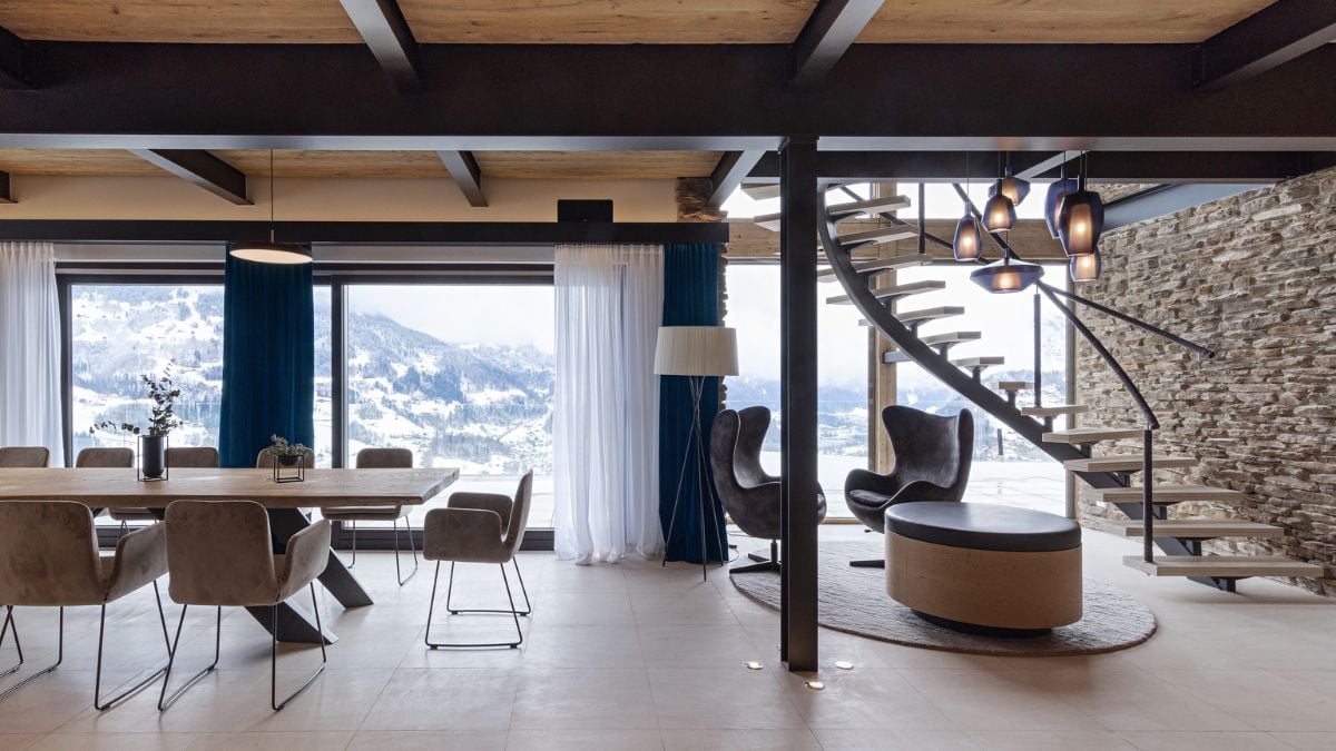 Each floor's large windows provide a unique perspective of the nearby mountains.