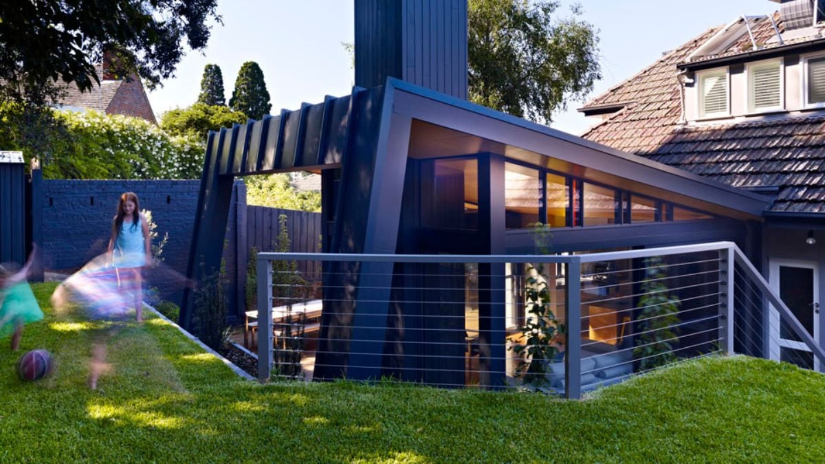 This elevated area of the lawn, which is a pleasant place to play, is a portion of the house's outside space.