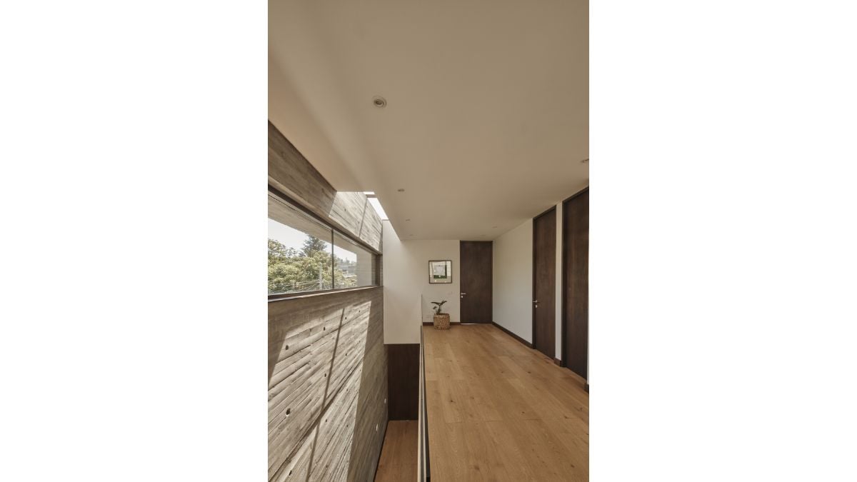 The second floor, which is more private, has a huge master bedroom, a guest bedroom, and a living area.