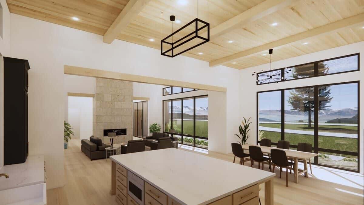 An oversized opening connects the eat-in kitchen and family room.