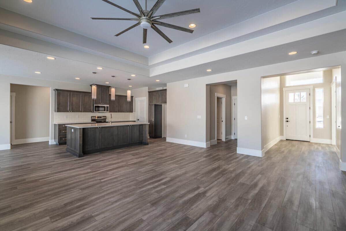 The foyer leads to the combined great room and kitchen.