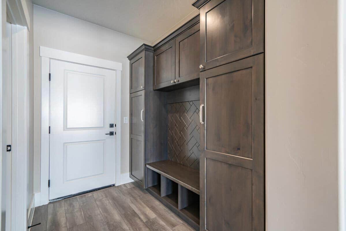 The mudroom offers lots of storage and a built-in bench.