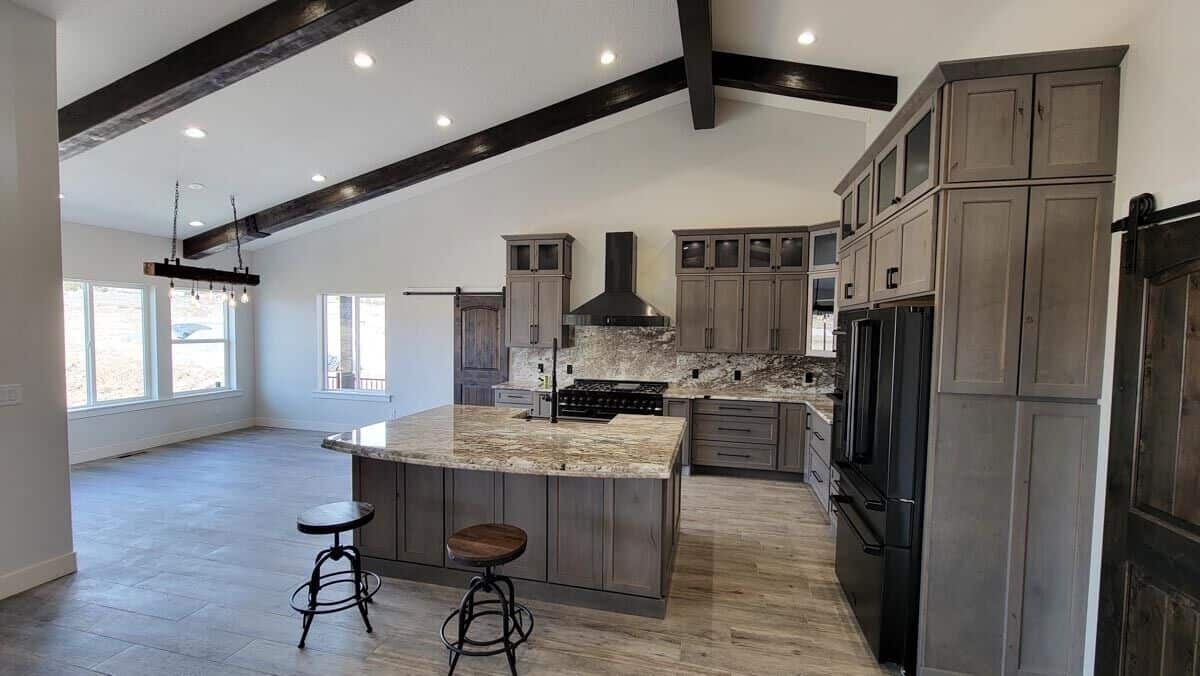 A spare space across the kitchen is dedicated to the dining area.