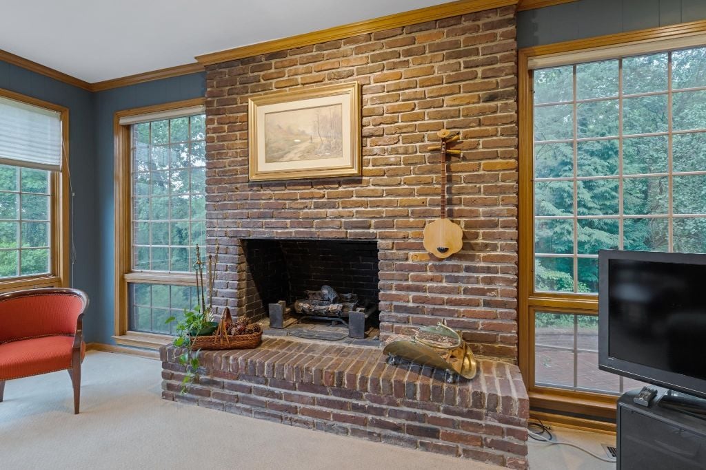 Fireplace built with bricks salvaged from the original Maxwell House Hotel after it burned on Chirstmas 1961. Gas logs included.