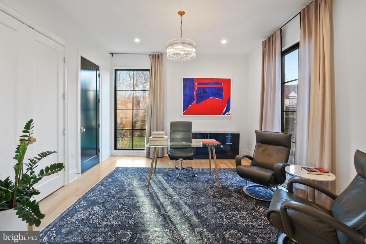The comfortable home office was made complete with the addition of a plush area rug, adding both warmth and style to the space.