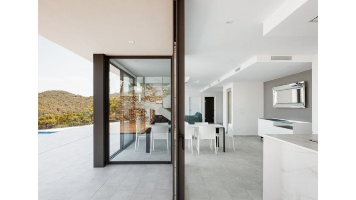 The glass sliding doors that open to the outdoors.
