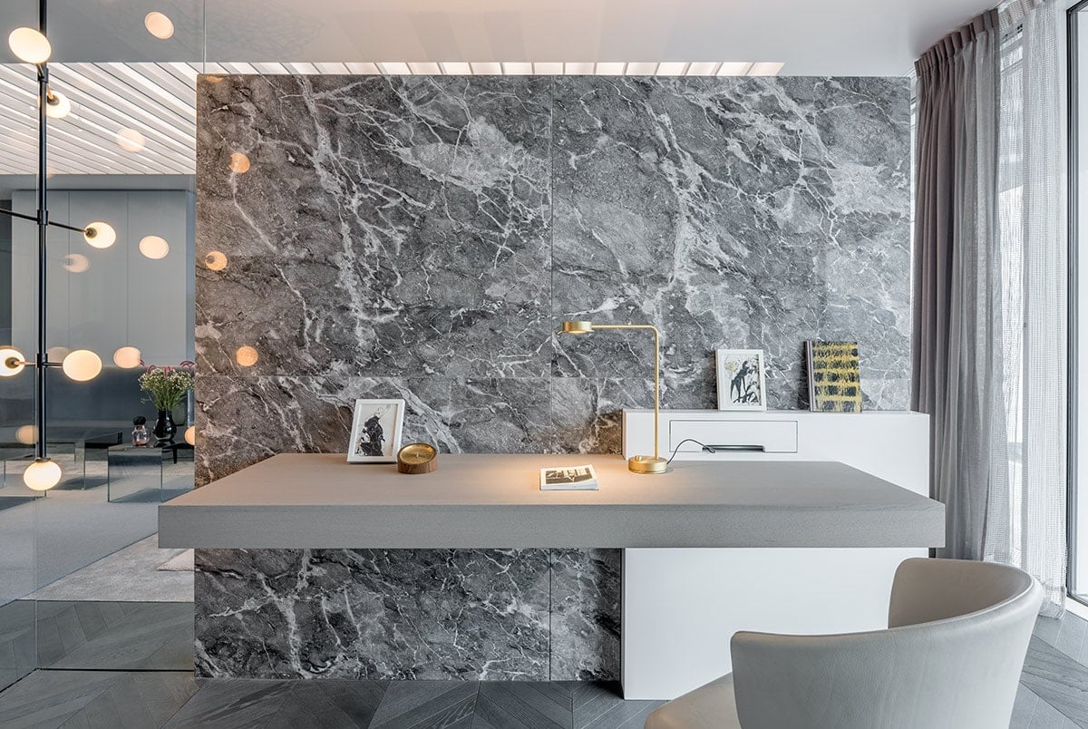 A grained Chinese marble graces the detached workspace.