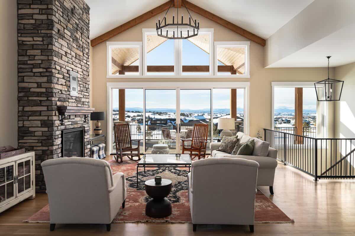 A rear wall of windows takes in ample natural light and magnificent views.