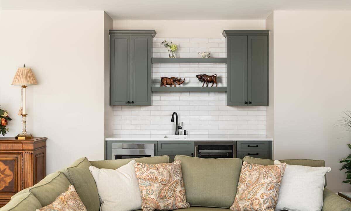 A wet bar with a built-in fridge completes the great room.