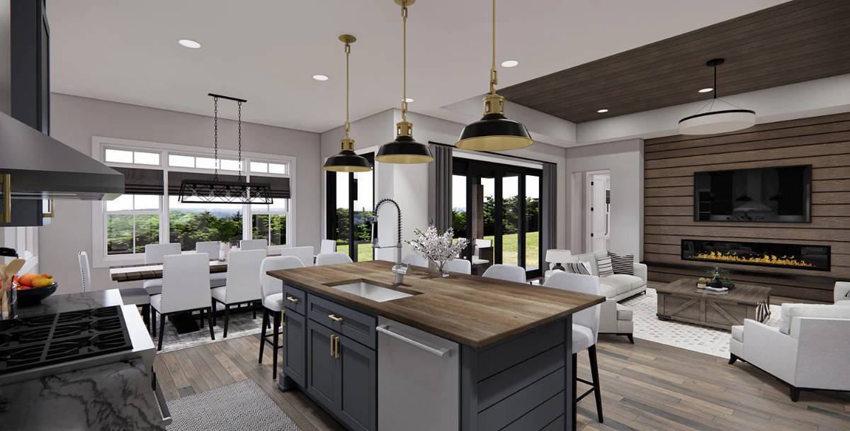 Large windows and glazed doors on the rear wall flood the open living space with an abundance of natural light.