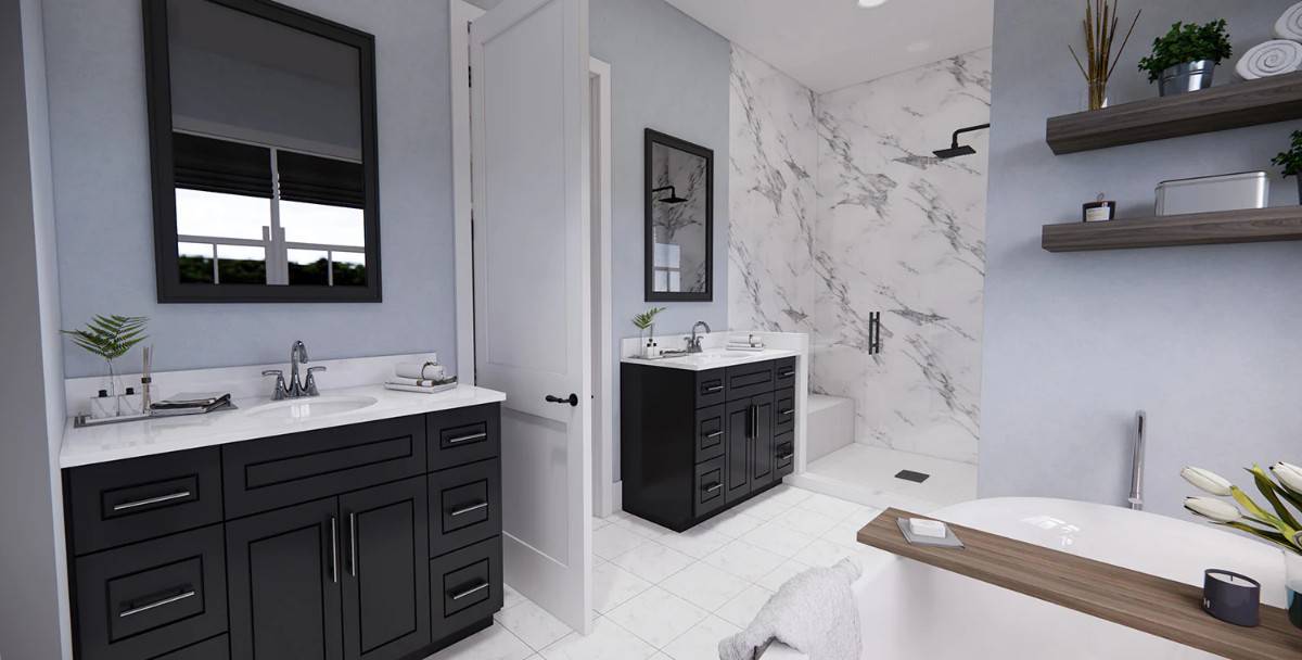 The primary bathroom is equipped with his and her sink vanities, a freestanding tub, and a walk-in shower with a tiled bench.