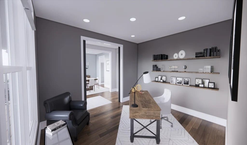 Study with leather chairs, a wooden desk, and floating shelves.