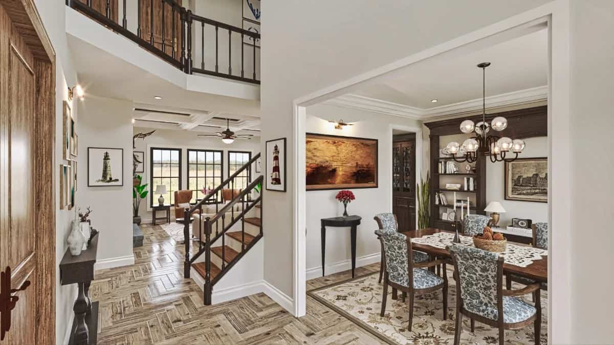 A two-story foyer with a formal dining room on its right greets guests upon entry.