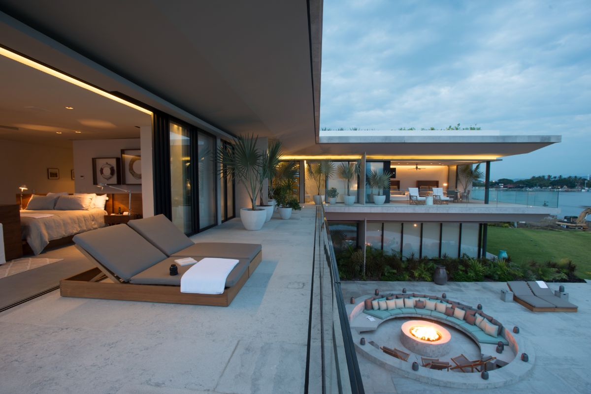 A view of the house from the second level highlighting the multifunctional interior spaces.