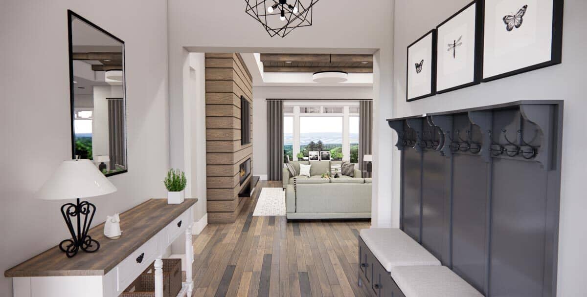 The foyer has a wooden console table and a coat rack with a bench.