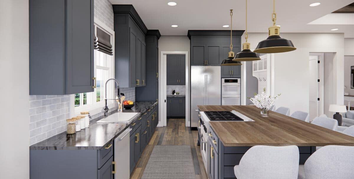 The kitchen includes stainless steel appliances and a walk-in pantry resting behind a pocket door.