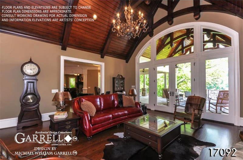 A French door extends the lodge room onto a covered porch.
