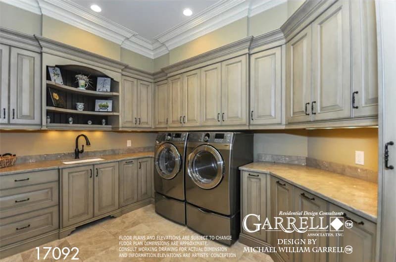 The laundry room is equipped with front-load appliances, light wood cabinets, and a utility sink.