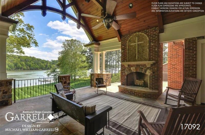 A large brick fireplace warms the vaulted porch.