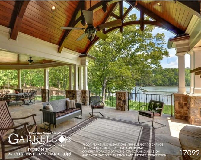 The expansive porch offers spectacular views of the surrounding landscape.