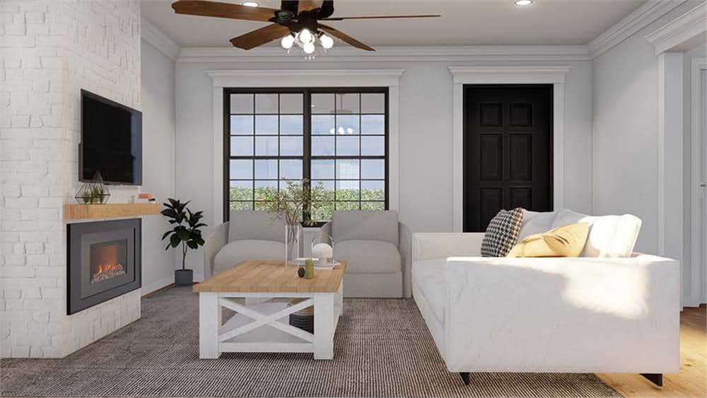 A large aluminum framed window brings natural light into the great room.