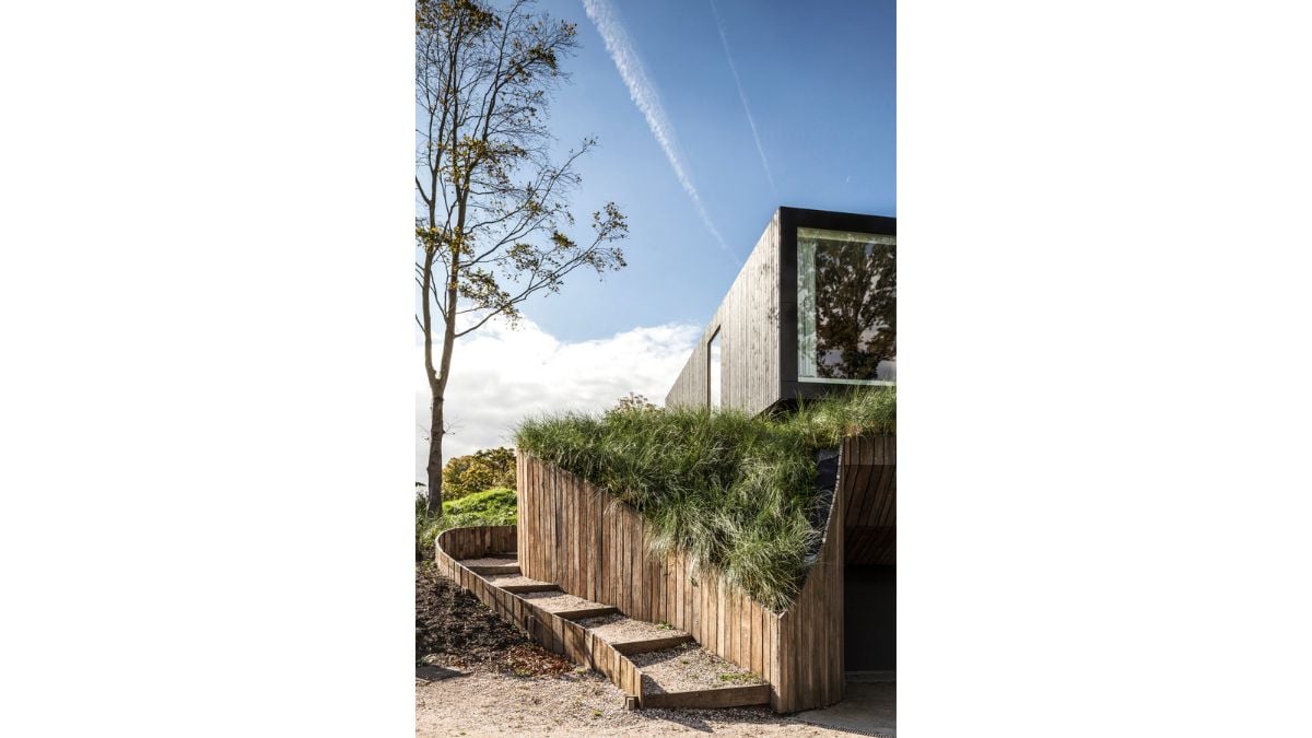 It is surrounded by nature and has a natural exterior.
