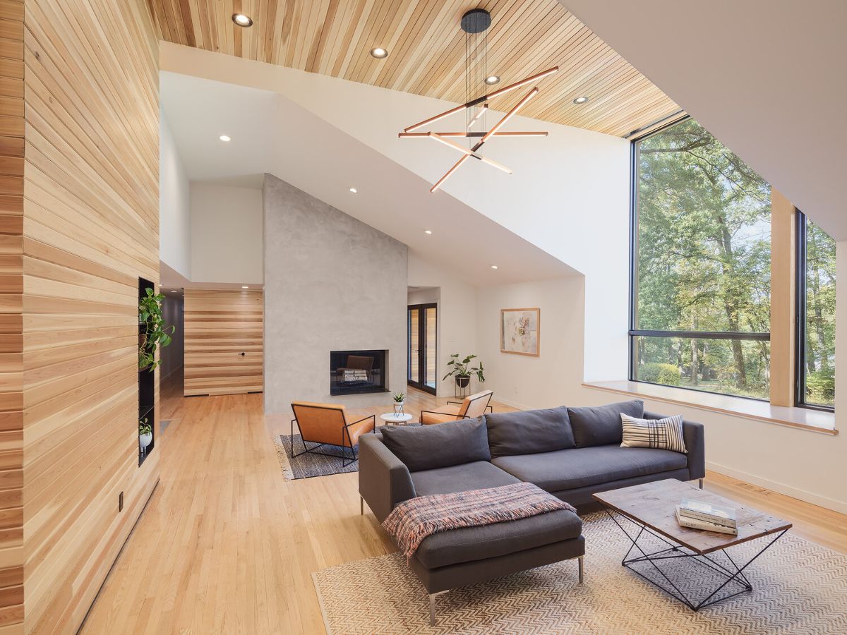 A dramatic mood is created by the living area, which has vaulted 8' ceilings and a cedar coated modern dormer.
