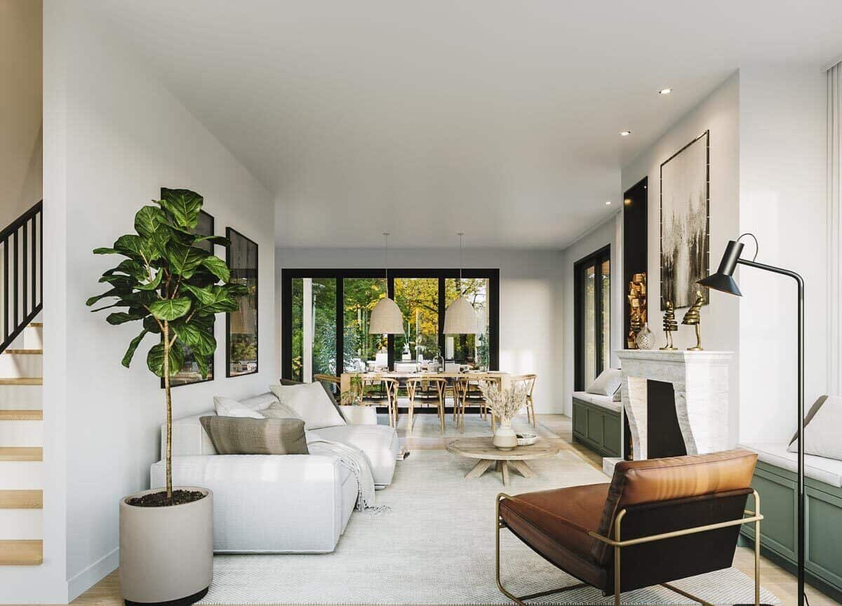 The living room offers an L-shaped sofa, a leather armchair, and a fireplace flanked by window seats.